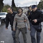 A demonstrator  is arrested by Israeli police during a demonstration against Jewish settlements and in solidarity with Palestinian families who were evicted from their homes in the Sheikh Jarrah.