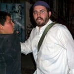 Settler attacks young boy in Sheikh Jarrah.