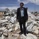 Ali Salim Mousa stands in the middle of the rubble of his house, demolished on 14.04.2010, in Al Khader.