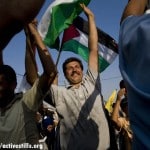 Adeeb Abu Ramah at a Bil'in demonstration. Abu Rahma has been imprisoned for nearly one year on charges of "incitement" , for organizing nonviolent demonstrations.