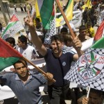 Adeeb Abu Rahmah (centre) during a demonstration in Bil'in. PHOTO CREDIT: Oren Ziv/ActiveStills