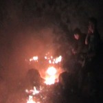 villagers attempt to put out fire in Saffa valley