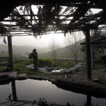A female Israeli soldier stands next to a man-made pool containing water from a spring located near the West Bank village of Nabi Saleh, and the Jewish settlement of Halamish, near Ramallah March 19, 2012. REUTERS/Baz Ratner