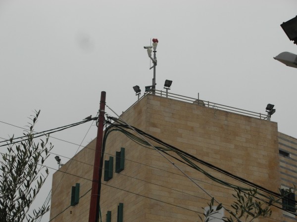 Cameras and lights installed above the home by the military