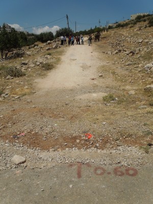 Road marker placed by settlers (Photo by ISM)