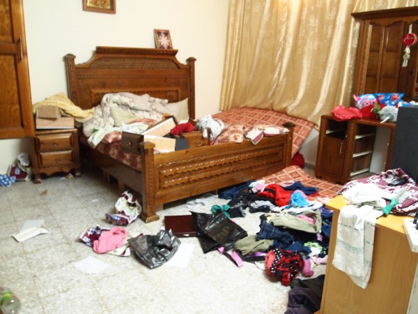 The ransacked home of arrested siblings Tahrir and Saddam