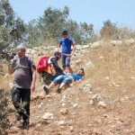 Injured protester being treated on spot by Red Crescent personnel (Photo by ISM)