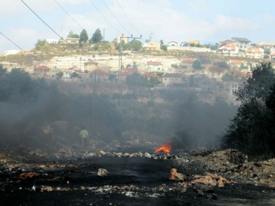 Tyre barricades burning (Photo by IWPS)