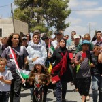 Protesters marching at last Friday demonstration in Nabi Saleh (Photo by Tamimi Press)