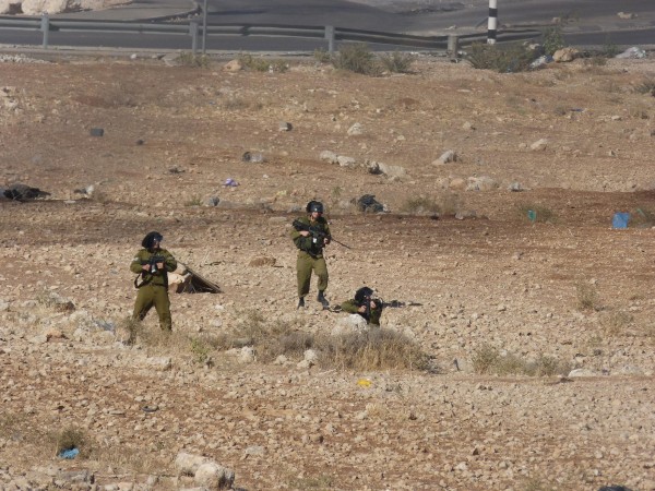 Israeli soldiers shooting rubber bullets close to the Bedouin community
