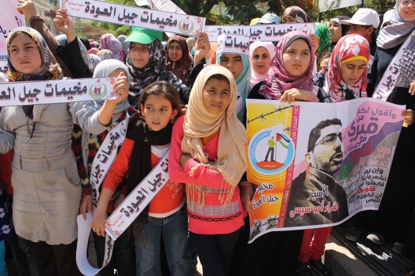 Young supporters of Dirar Abu Sisi rallied on Gaza on 10 July. (Photo by Joe Catron)
