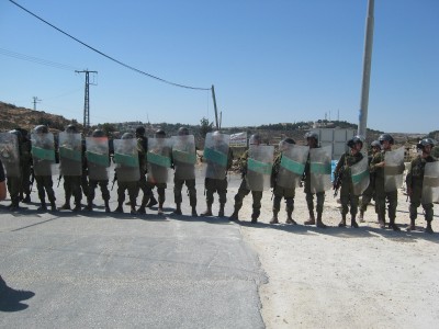 Soldiers blocked residents from reaching their own land (Photo by ISM)