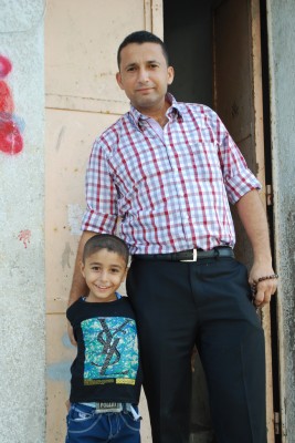 A father and son in their Eid clothes. (Photo by Charlie Andreasson)