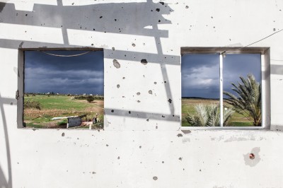 The "buffer zone" is seen from the second floor of Nasser Abu Said's house in Jahr el-Deek. On 28 April 2011 the house, which stands 300 meters from the separation barrier, was shelled by Israeli tanks and partially destroyed. (Photo by Desde Palestina)