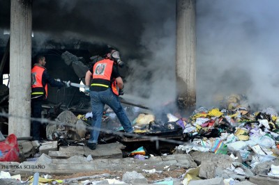 Civil Defense crews work to clear the rubble left by an Israeli airstrike on 31 January. (Photo by Rosa Schiano)