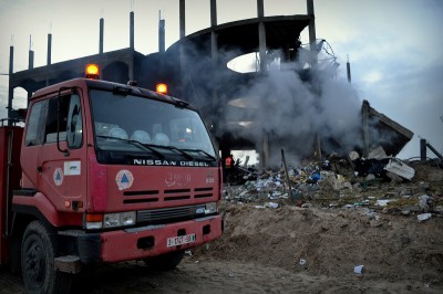 A Civil Defense truck sits outside the site of an Israeli airstrike on 31 January. (Photo by Rosa Schiano)