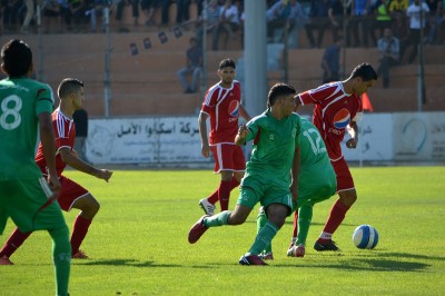 A football match in Yarmouk stadium. (Photo by Rosa Schiano)