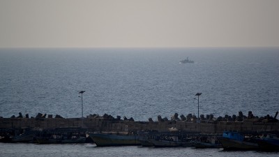An Israeli gunship cruises near the Gaza seaport. (Photo by Rosa Schiano)