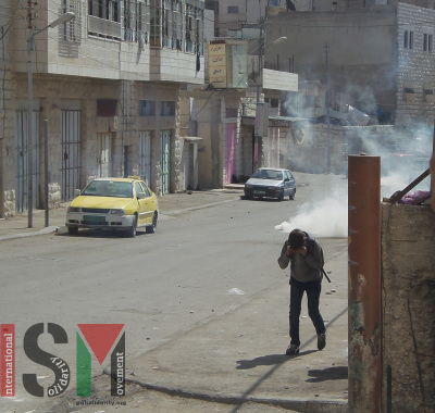 A child trying to escape tear gas fired by the Israeli military close to several schools on October 13th in the Salaymeh neighbourhood of Hebron