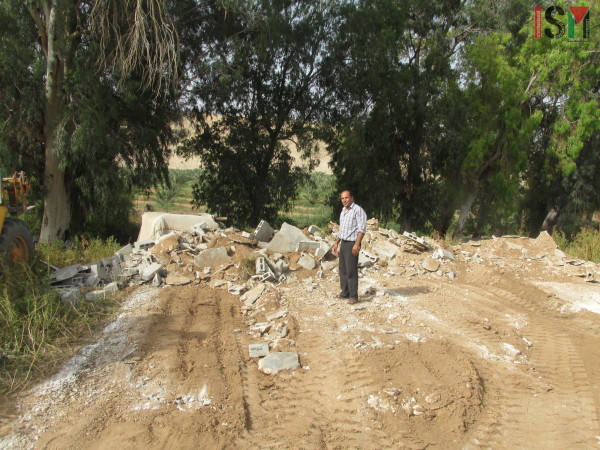 Mahmod Lahafe Dadoub on the spot where his family's home was. 