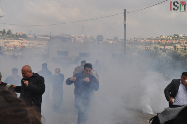 Protestors being tear gassed 