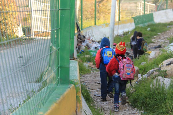 Palestinian kindergarteners are forced to use the dangerous route by Israeli forces