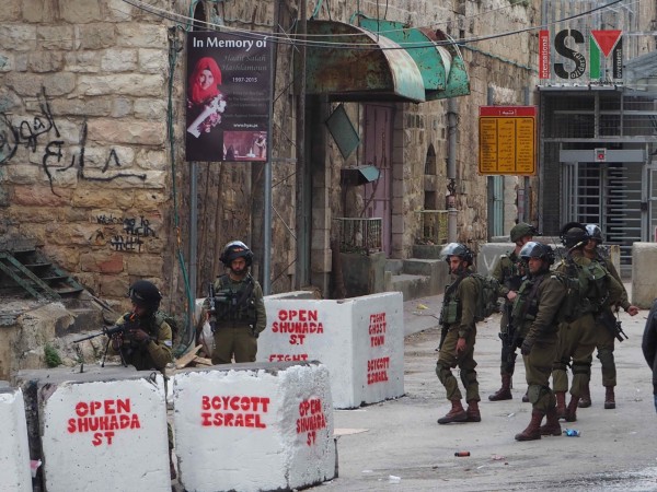 Israeli forces emerging from the checkpoint into supposedly Palestinian controlled H1