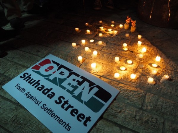 Candles lit in memory of those lost in the Ibrahimi Mosque massacre of '94