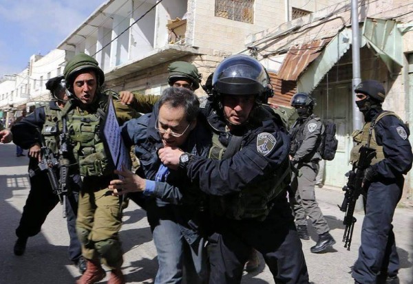 Israeli forces using excessive force arresting an activist