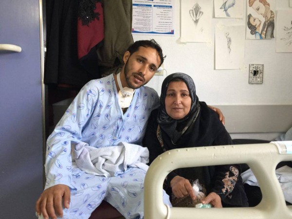 Mahmoud and his mother in hospital
