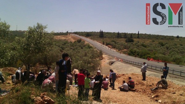 Farmers in Deir Istiya protesting the closure of their agricultural roads