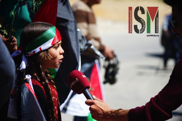 A young girl being interviewed prior to the demonstration 