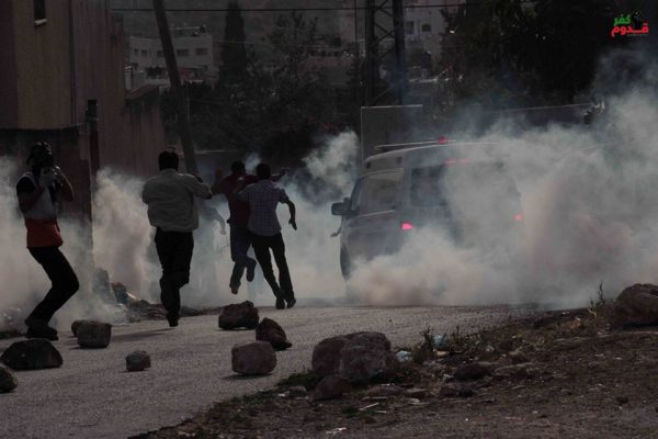 A Palestinian ambulance covered in tear gas shot by Israeli forces Photo credit: Kafr Qaddum demonstration