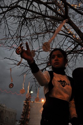 Children from Bethlehem read the names of the children killed last year in Gaza during the massacre and hung their names from a tree.