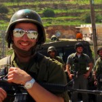 Israeli Occupation Force soldier daydreams about quitting time in Al-Ma'sara.