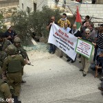 Soldiers, armed to the teeth, meet non-violent protesters in Beit Jala.