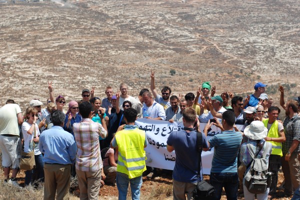 Aqraba residents and internationals gather to plant the olive trees