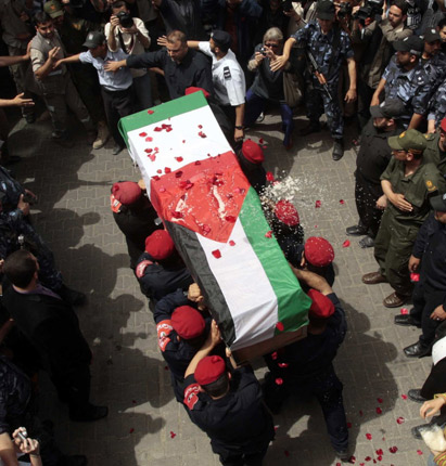 Thousands of Gazans participate in slain Italian activist’s funeral