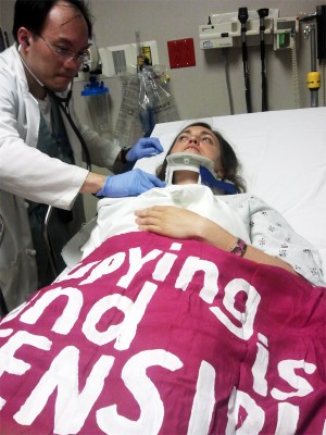 Rae Abileah in the hospital after being injured as police removed her from Congress.