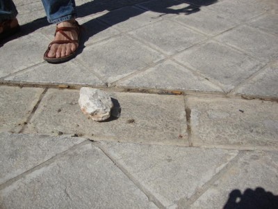 A stone thrown by Israeli settlers at Palestinians