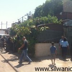 Israeli police stand outside Karki family home