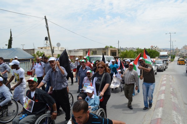 Demonstrators marching through Tulkarem (Photo by ISM)