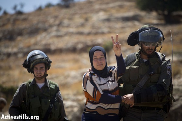 Palestinian activist Neriman Tamimi today being arrested (Photo by: Oren Ziv/Activestills)