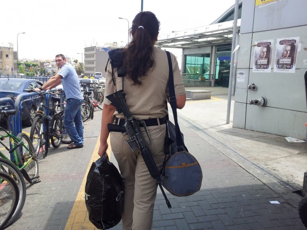 Israeli young female on the Israeli military service uniform