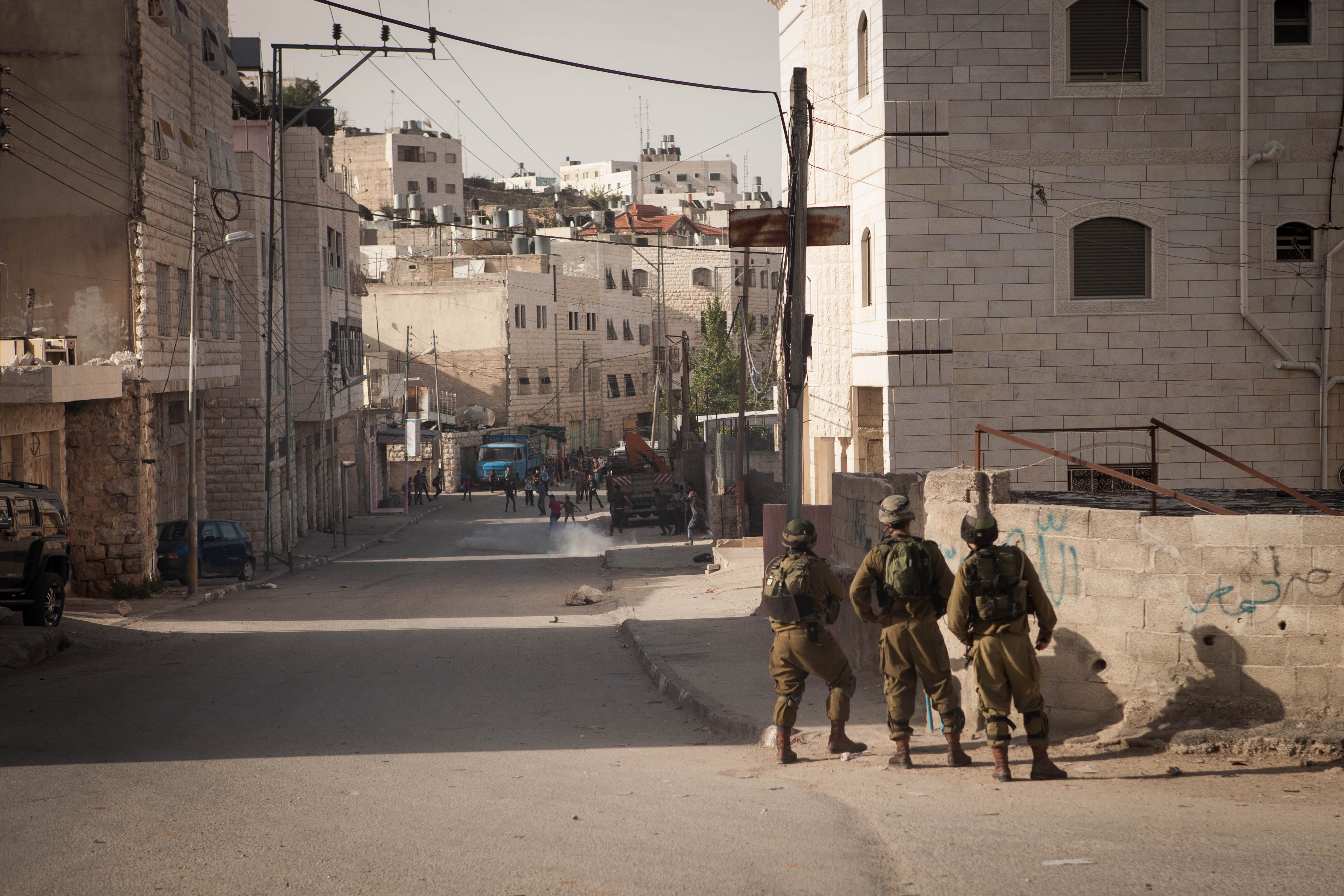 VIDEO: Israeli forces fire tear gas and stun grenades at children in Hebron