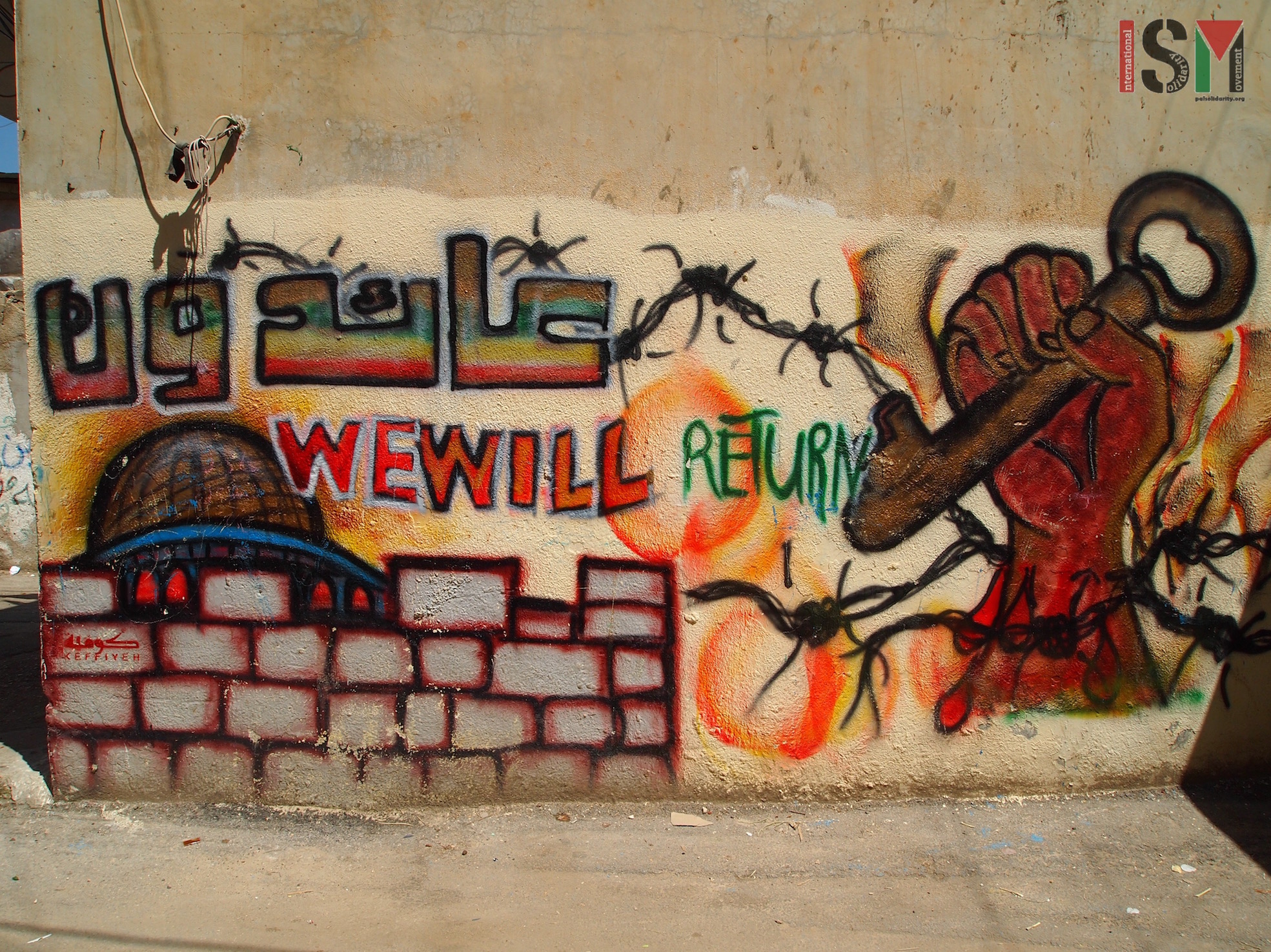 "We will return". The camp's walls are covered in graffiti of resistance