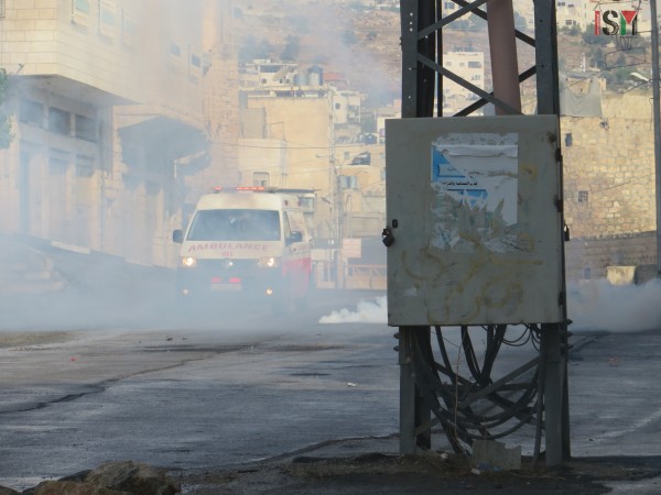 Palestinian ambulance forced to go through clouds of tear gas