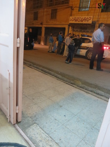 Settlers outside Ghassans shop