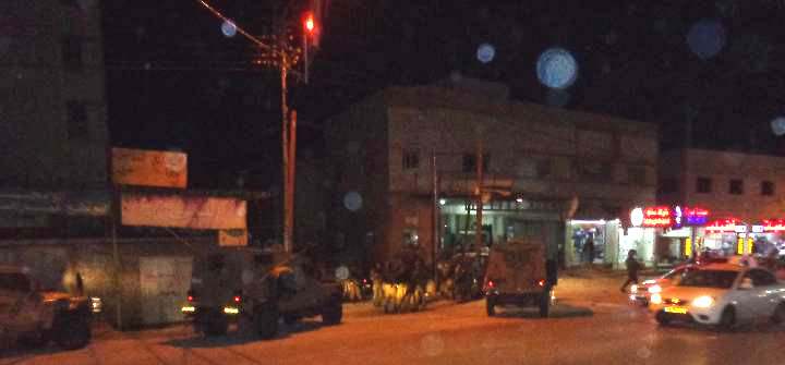 Soldiers and illegal settlers invade Huwarra, assault business owner