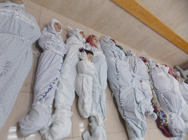 Children killed during the Zionist slaughter in Gaza 2014. Photo taken at Al Aqsa Martyrs Hospital, Deir Al Balah, central Gaza Strip.